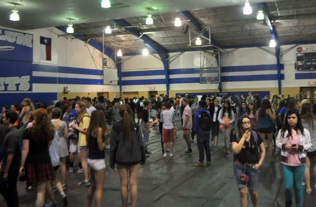 Students walked around the gym and looked at different booths during the fair as they considered which electives they want to join next school year.