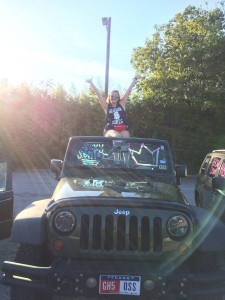 Senior Marley Chilton poses on her decorated car for the first day of school. Photo provided by Chilton.