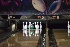 The team enjoyed a barrage of strikes at the end of their first practice game at Dart Bowl on Jan. 27. Photo by Sydney Amell.