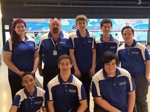 The bowling team at Dart Bowl before a match. Front row: Anthony Bourda, Oliver Cline and Max Cioc. Back row: Olivia Foletta, Randy Cannon (coach), Gordon Bolton, Michael Yost and Noah Powell.