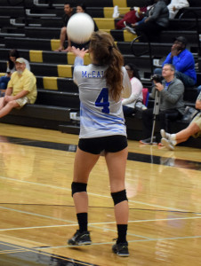 Senior Greta Colombo serves during the Lady Knights' 3-0 sweep at Lanier on Sept. 27. Photo by Janiyah Baker.
