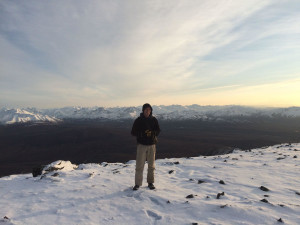 Hayden Price stands at the top of a peak at Denali National Park in Alaska. Photo courtesy of Hayden Price.
