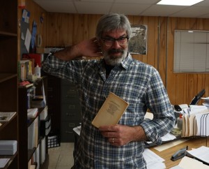 Mr. Wydeven sporting a copy of For Whom the Bell Tolls. Photo by Madison Olsen.