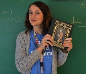 Ms. Northcutt holds her copy of Frankenstein. Photo by Madison Olsen.