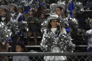 Senior Ariella Dos Santos cheers on the football team during a game at House Park last fall. Photo by Brooke Miller.