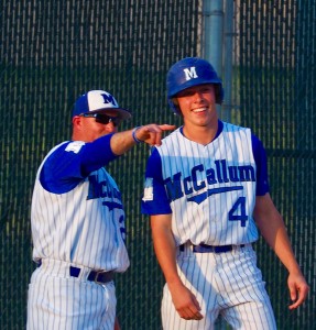 Coach Houston and then junior Davis Roe at this year's regular season finale against Reagan at Northwest Pony Field. Photo by Gregory James.